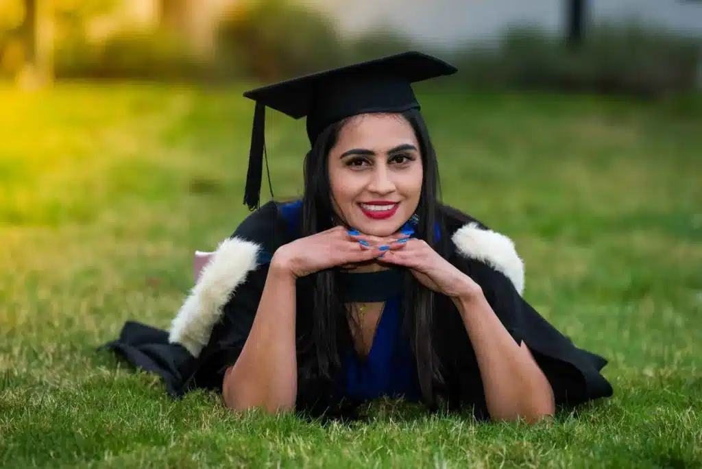A skilled photographer capturing the essence of the graduation ceremony